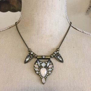 Stone covered brass amulet snake chain necklace